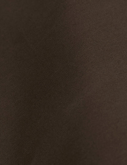 Carl brown shirt