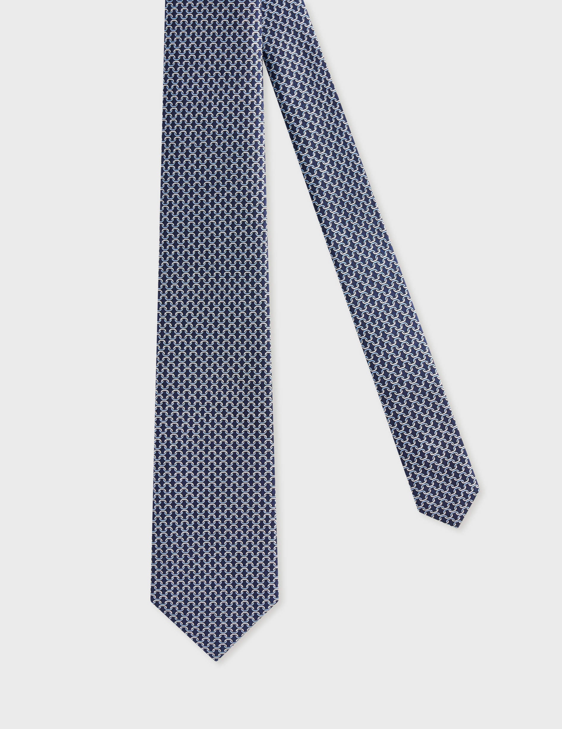 Cravate fine en soie bleue à motifs