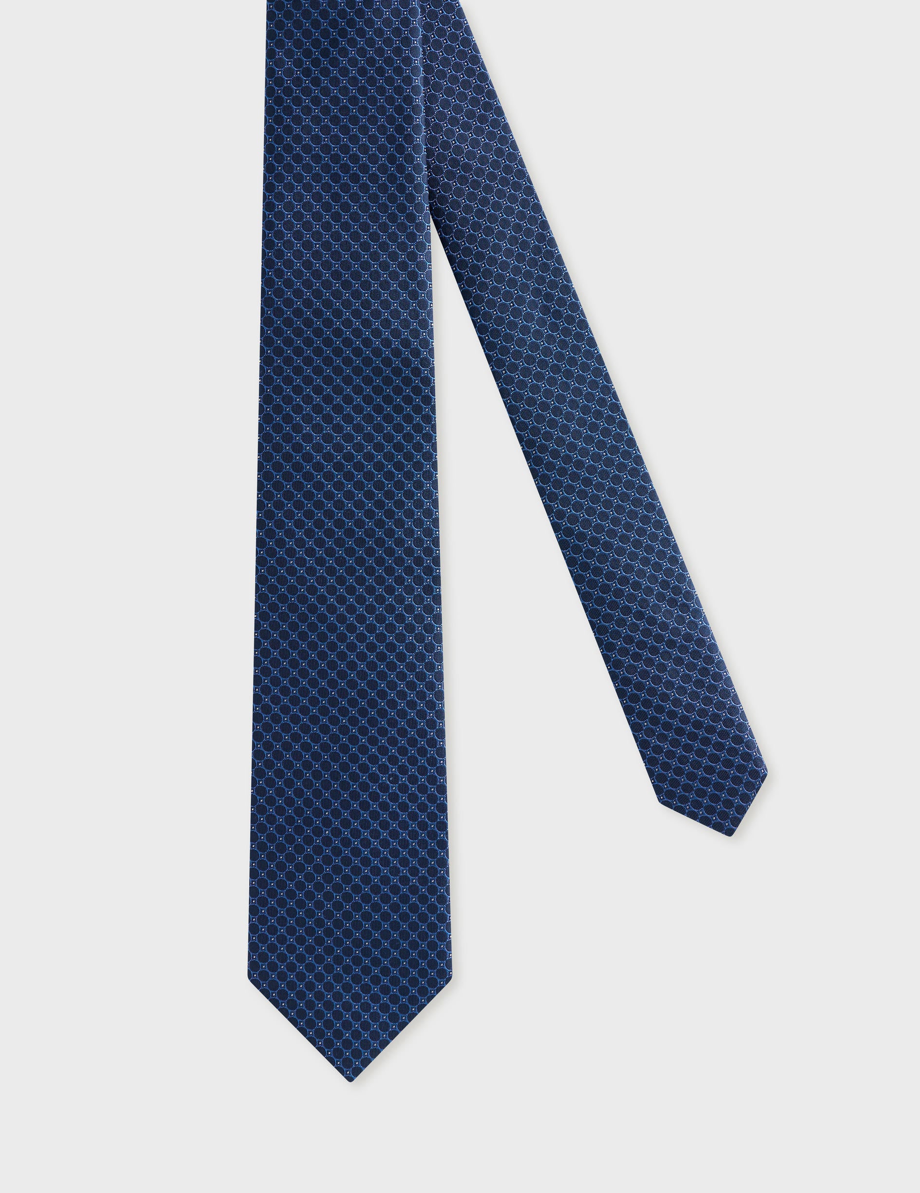 Cravate fine en soie marine à motifs